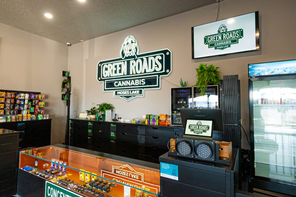 dispensary checkout counter and products at green roads cannabis