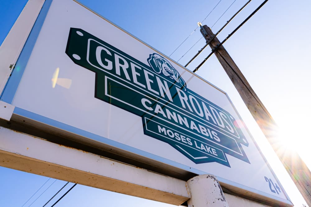 community Green Roads Cannabis Store Sign
